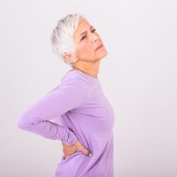 How to relieve back pain by breathing?